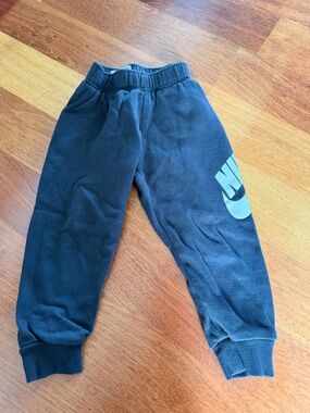 Nike Kids Black Sweatpants with Teal Logo
